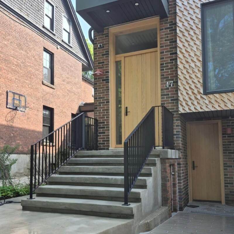 Custom exterior steel railings with flat bar frame and flat bar pickets